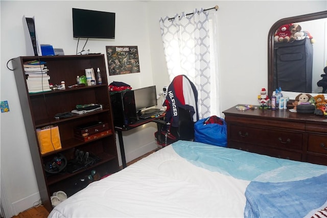 bedroom featuring hardwood / wood-style flooring