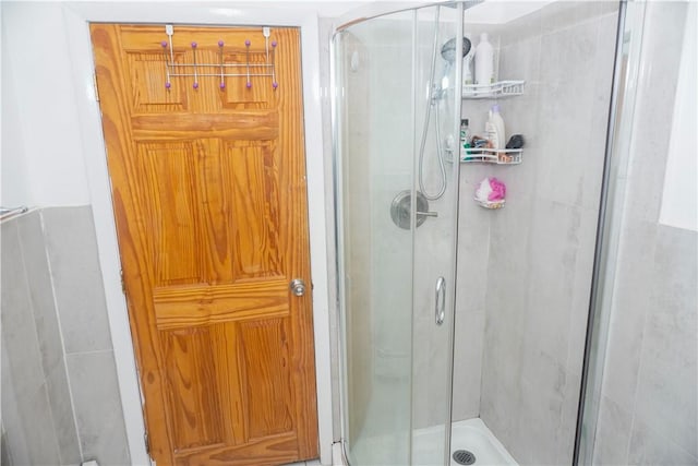 bathroom with an enclosed shower