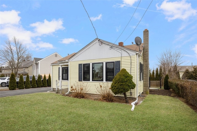 view of front of home with a front yard