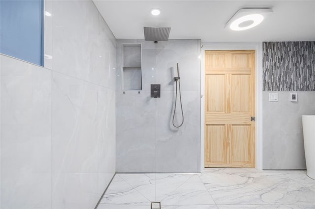 bathroom featuring walk in shower