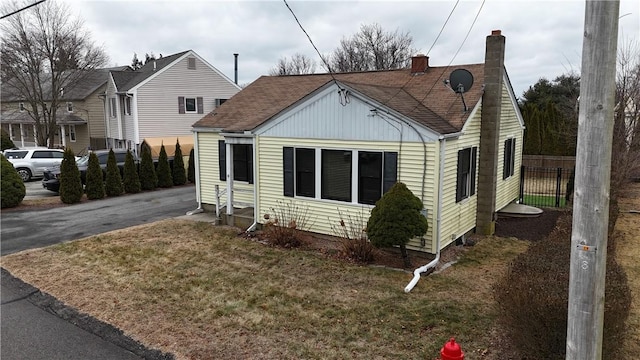 bungalow with a front yard