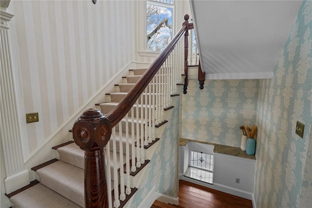 stairway featuring hardwood / wood-style flooring