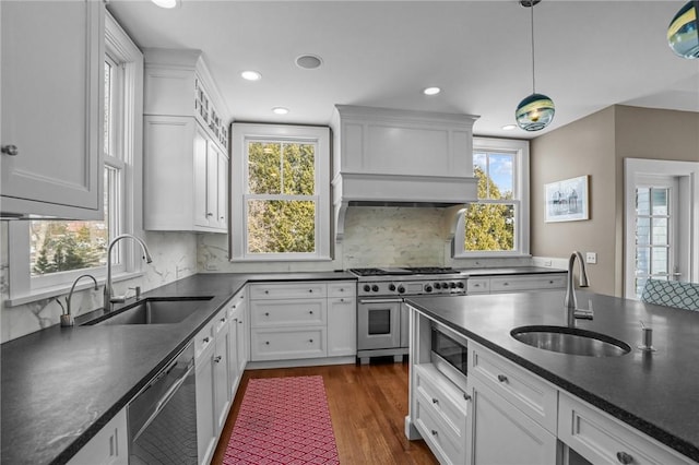 kitchen featuring white cabinetry, sink, and stainless steel appliances