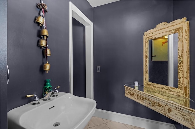 bathroom featuring tile patterned flooring and sink