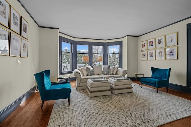 living room featuring ornamental molding and hardwood / wood-style floors