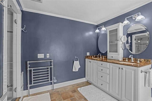 bathroom featuring crown molding, vanity, and walk in shower