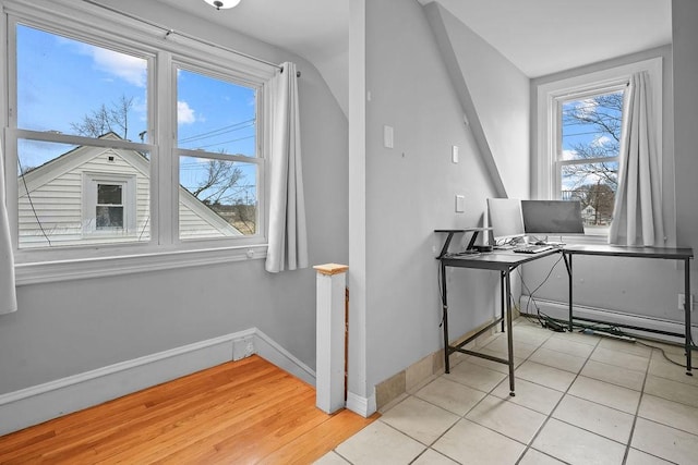 home office with light tile patterned floors