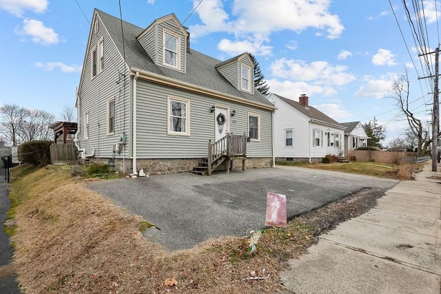 view of cape cod-style house