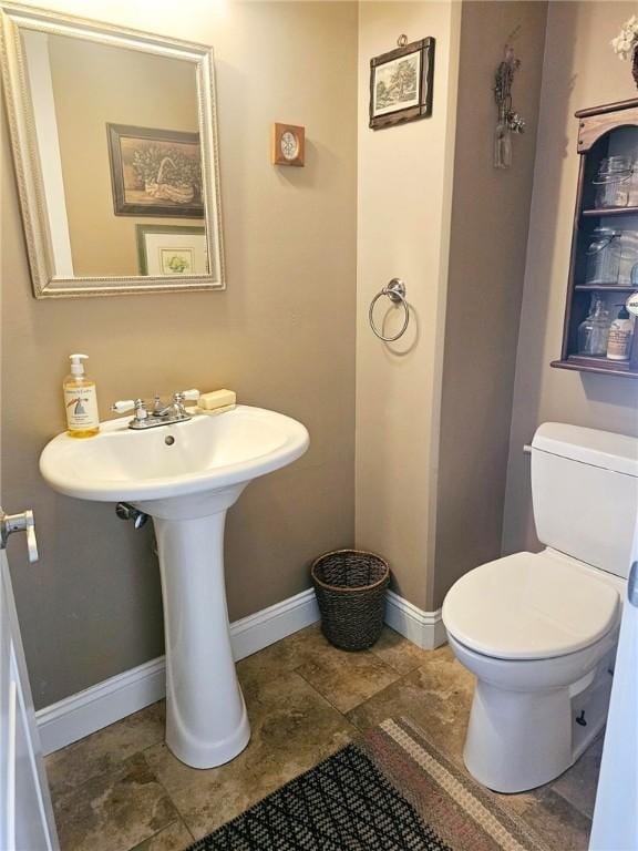 bathroom featuring toilet