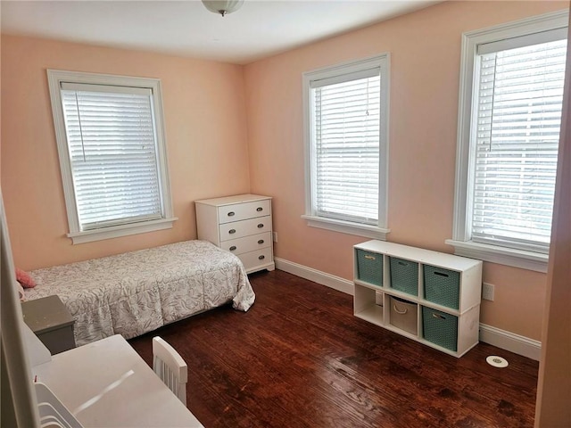 bedroom featuring dark hardwood / wood-style floors