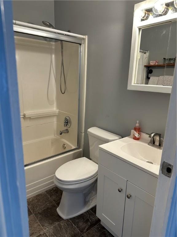 full bathroom featuring vanity, toilet, and bathtub / shower combination