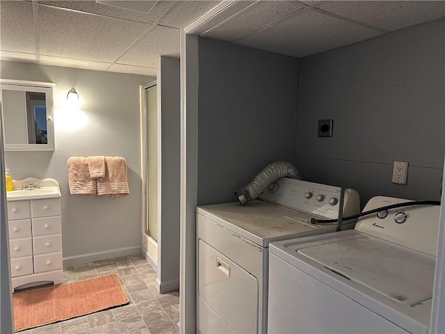 laundry area with washing machine and dryer