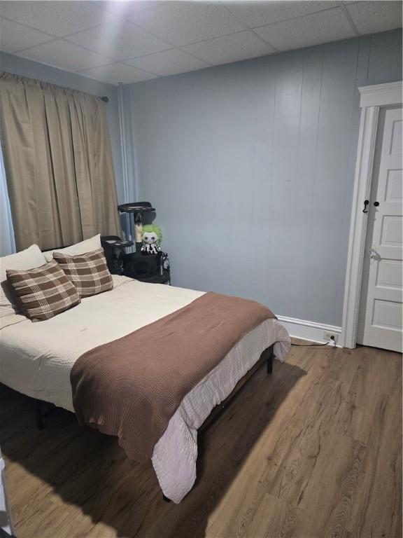 bedroom featuring hardwood / wood-style flooring