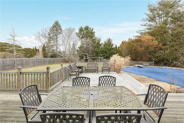 deck with a covered pool