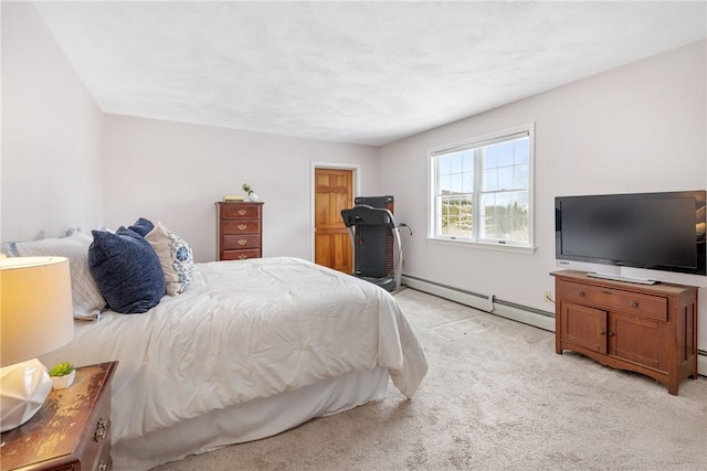 carpeted bedroom with baseboard heating