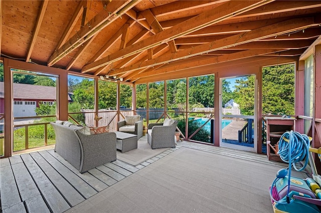 unfurnished sunroom featuring wooden ceiling and vaulted ceiling with beams