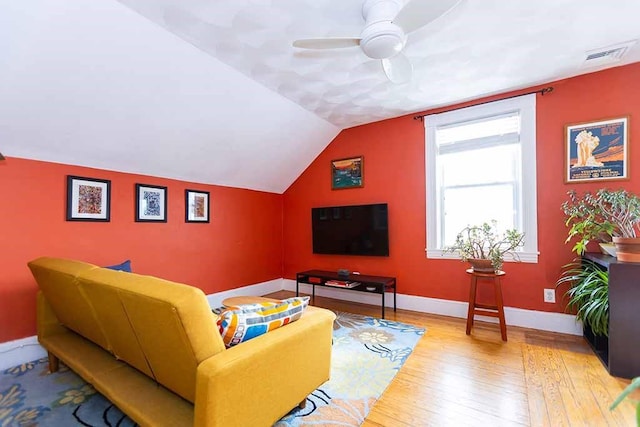 interior space featuring ceiling fan, light hardwood / wood-style flooring, and lofted ceiling