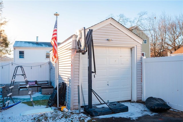 view of snow covered garage