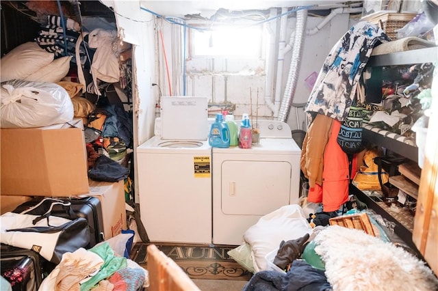 washroom with independent washer and dryer