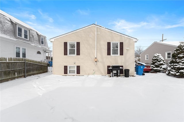 view of snow covered house