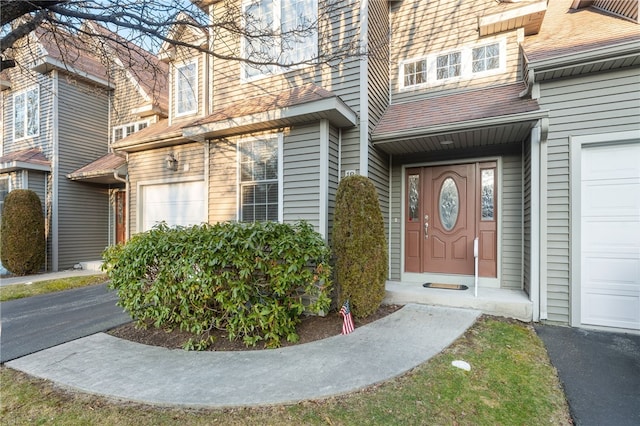 entrance to property featuring a garage