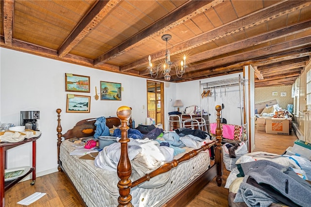 bedroom with wooden ceiling, hardwood / wood-style flooring, a chandelier, and beam ceiling