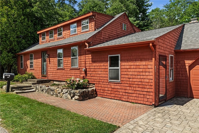 exterior space with a garage