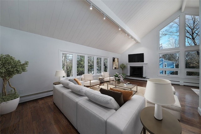 living area with a baseboard heating unit, beam ceiling, wood finished floors, and a high end fireplace