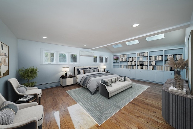 bedroom featuring a baseboard heating unit, lofted ceiling with skylight, a wall mounted air conditioner, recessed lighting, and wood finished floors