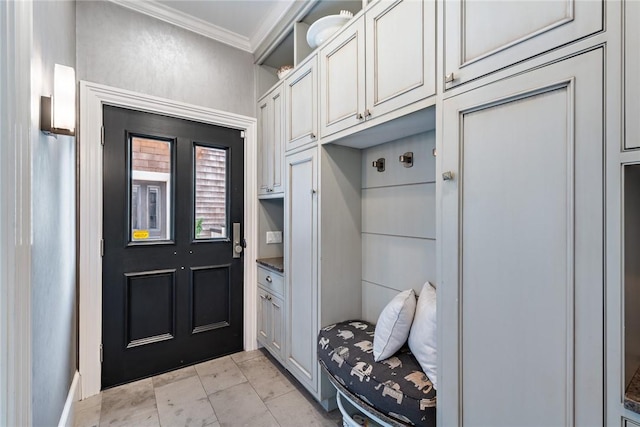 mudroom featuring ornamental molding