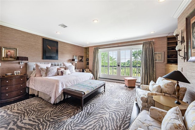 carpeted bedroom featuring ornamental molding and french doors