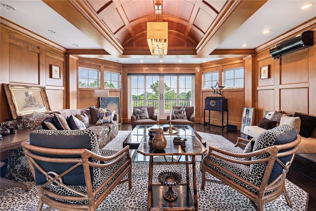 interior space with ornamental molding, wood-type flooring, coffered ceiling, and beam ceiling