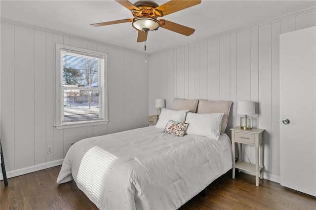 bedroom featuring dark hardwood / wood-style floors and ceiling fan