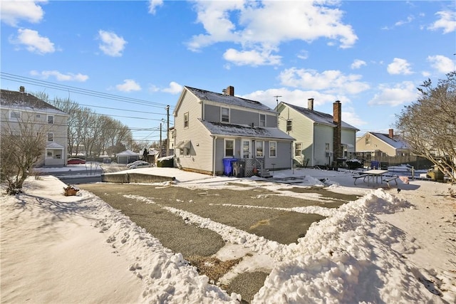 view of snow covered property