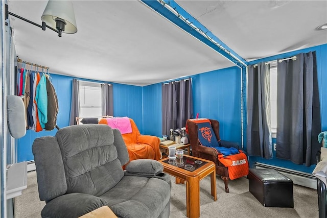 living area featuring a baseboard radiator and light carpet