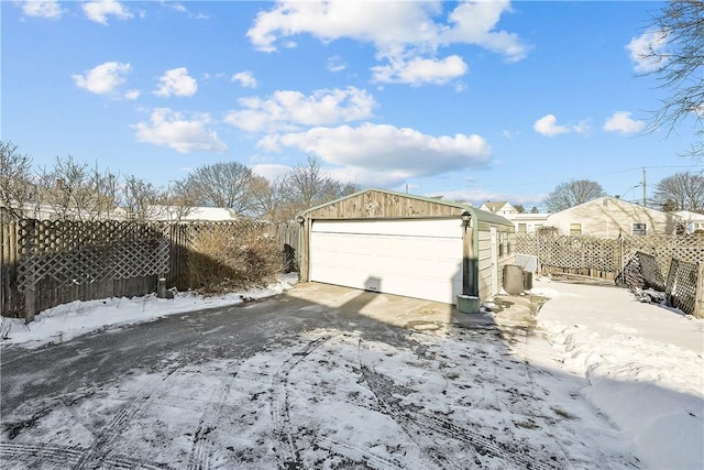 view of snow covered garage