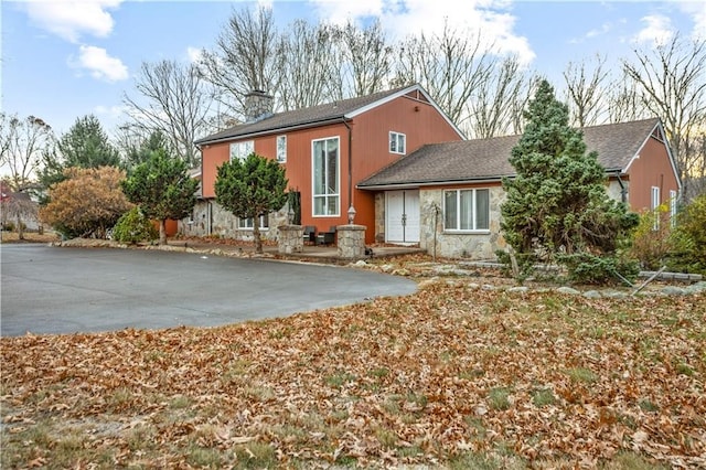 rear view of house featuring a patio area