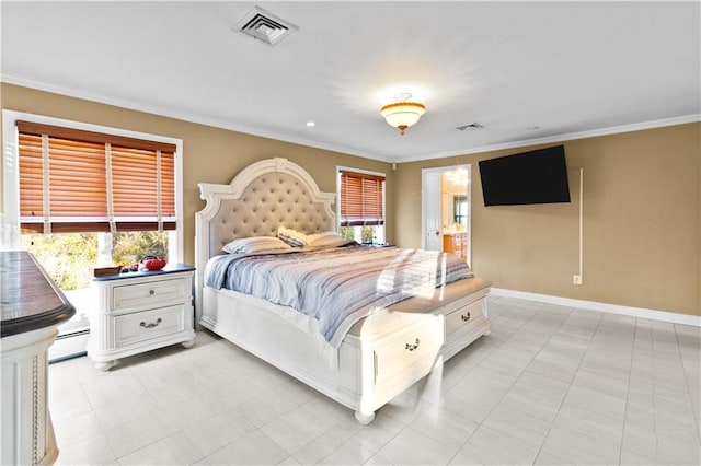 bedroom with a baseboard heating unit and ornamental molding