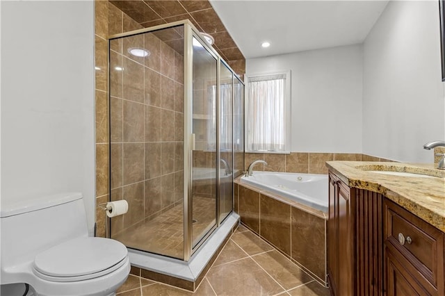 full bathroom featuring vanity, shower with separate bathtub, tile patterned floors, and toilet