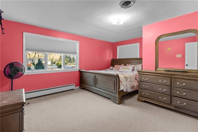 carpeted bedroom with baseboard heating