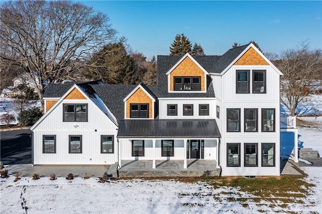 view of snow covered property