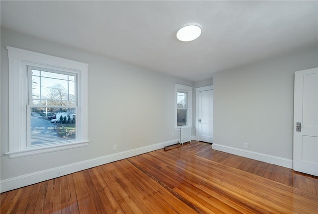 empty room featuring hardwood / wood-style floors