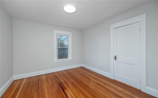 unfurnished room featuring light hardwood / wood-style floors