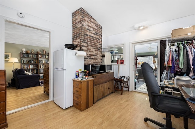 office space with light wood-type flooring