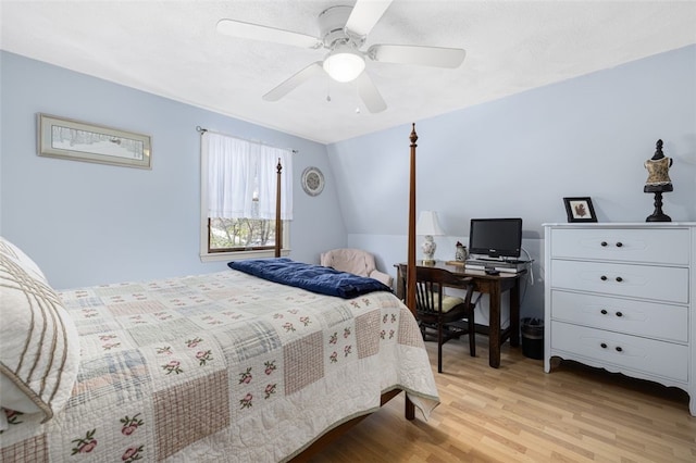 bedroom featuring vaulted ceiling, ceiling fan, and light hardwood / wood-style floors