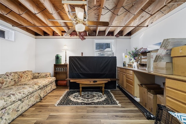 interior space with ceiling fan and light hardwood / wood-style floors