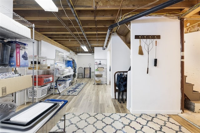 basement with wood-type flooring