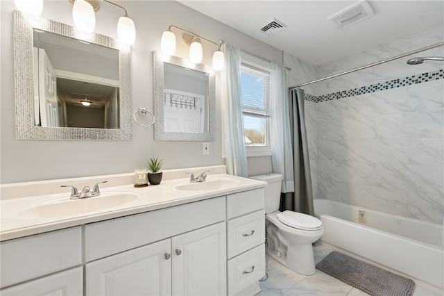 full bathroom featuring toilet, vanity, and shower / bathtub combination with curtain