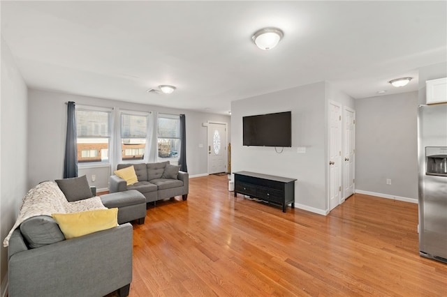 living room with light wood-type flooring