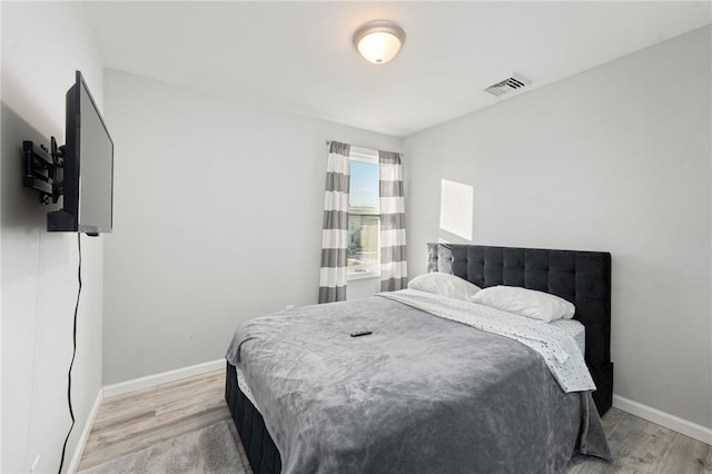 bedroom featuring light hardwood / wood-style flooring